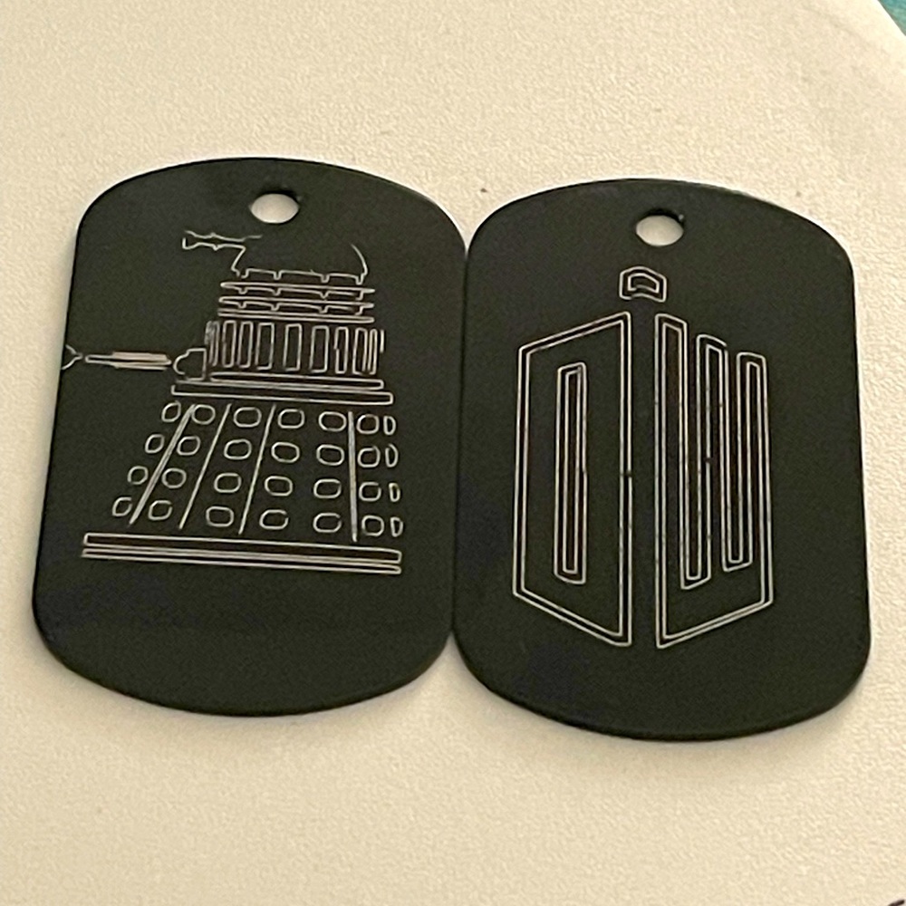 Dr Who black/silver dog tag set Dalek and DW tardis symbol. Unisex jewelry.